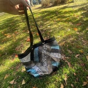 Large leather bag stitched metallic